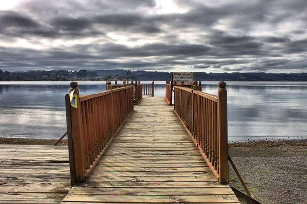 Wooden pier at Llanquihue lake in Puerto Octay, Chile - Photo, Image