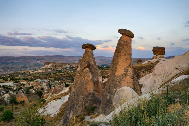 Large-scale panoramic view of Cappadocia, natural geological formations of extraordinary beauty. Famous touristic destination in Turkey - Foto, imagen