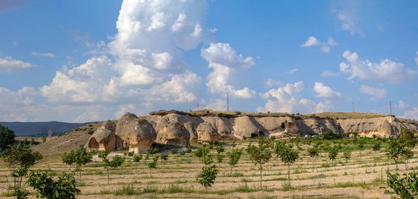 Large-scale panoramic view of Cappadocia, natural geological formations of extraordinary beauty. Famous touristic destination in Turkey - Valokuva, kuva