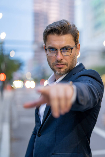 Business man goals. Success of business man point you outdoor. Hispanic businessman happy at the city. Serious businessman pointing finger on you. Portrait of businessman in suit outdoor - Foto, immagini