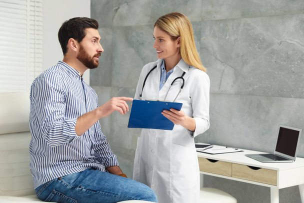 Patient having appointment with doctor in clinic - Photo, image