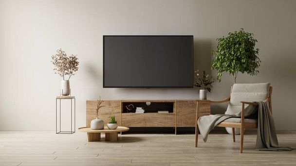 Mockup ένα ντουλάπι τηλεόραση τοίχο τοποθετείται με πολυθρόνα στο σαλόνι με ένα χρώμα κρέμα τοίχου.3d απόδοση - Φωτογραφία, εικόνα
