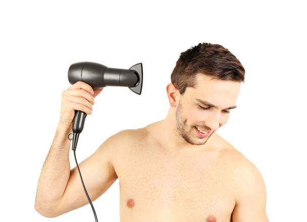 Bello giovane uomo soffiare asciugandosi i capelli isolati su bianco
 - Foto, immagini