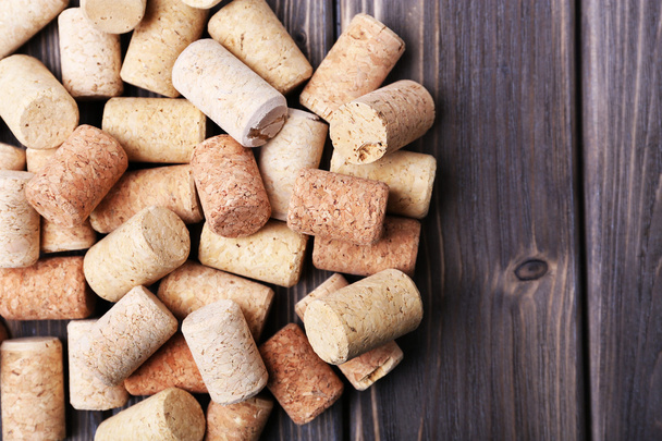 Wine corks on wooden background - Foto, imagen