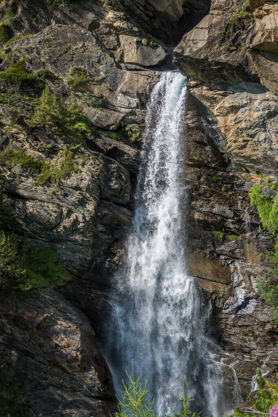 stream flows among the rocks and creates an alpine waterfall - Fotó, kép
