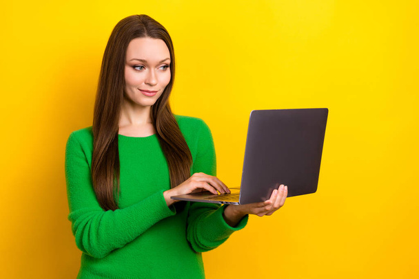 Photo of pretty lady hold use wireless netbook eshopping coworking isolated on yellow color background. - Fotografie, Obrázek
