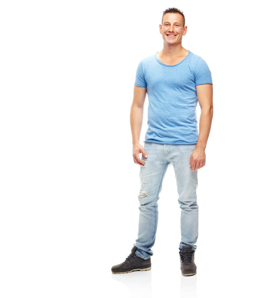 Casually handsome. A full length portrait of a happy man isolated on white - 写真・画像