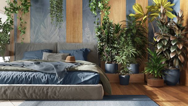 Heimgarten, minimalistisches Schlafzimmer in Blau- und Holztönen. Großaufnahme, Bett, Parkettboden und viele Zimmerpflanzen. Urbane Dschungel-Innenarchitektur. Biophilie-Konzept - Foto, Bild