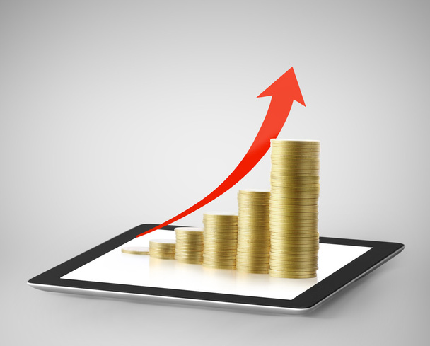 Tablet com gráfico de negócios e moeda de ouro
  - Foto, Imagem