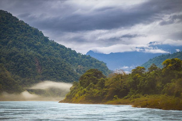 A beautiful shot of a river surrounded by mountains - Fotó, kép