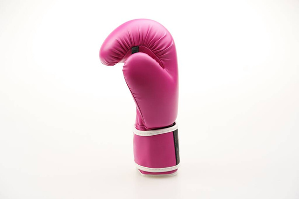A single pink boxing glove isolated on a white background - Foto, Imagen