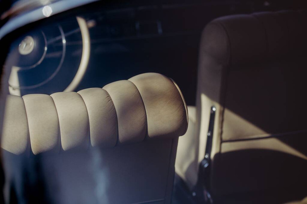 A closeup shot of an old-fashioned seats of a Mercedes Benz 220s from 60's - Foto, Imagen