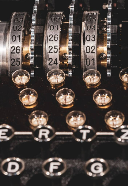 A plugboard, keyboard and rotors from German World War 2 Enigma machine on display at Bletchley Park - Фото, зображення