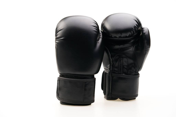 A pair of black boxing gloves isolated on a white background - Foto, afbeelding