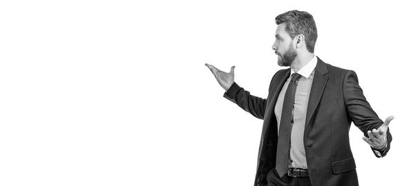 Gesticulating wildly. Businessman hold arms wide open gesticulating. Man with wide hand gesture. Man face portrait, banner with copy space. Business man in suit, isolated studio background - Photo, Image