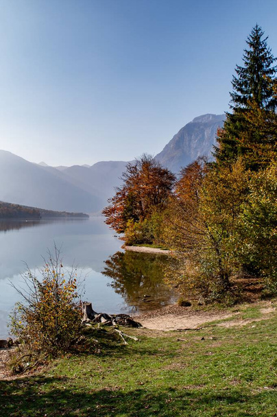 A scenic landscape in Lake Bohinj, Slovenia in autumn - Zdjęcie, obraz