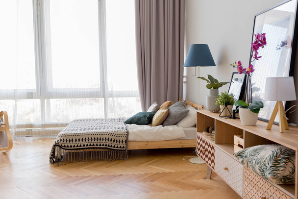 The interior design of the studio apartment in Scandinavian style. A spacious huge room in light colors. stylish expensive luxury furniture. - Photo, Image