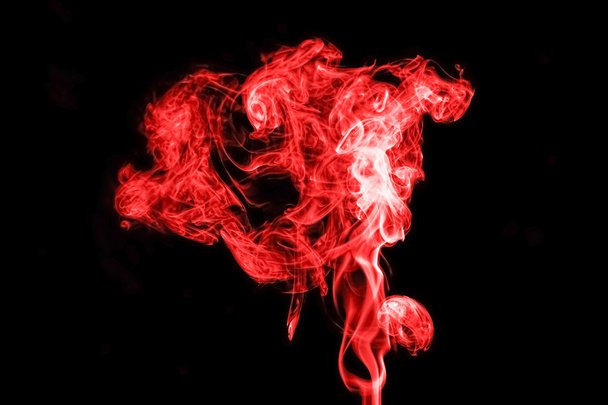 Red smoke on black background - Photo, Image