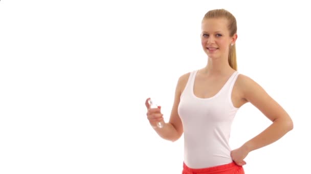 Young woman is using deodorant. - Felvétel, videó