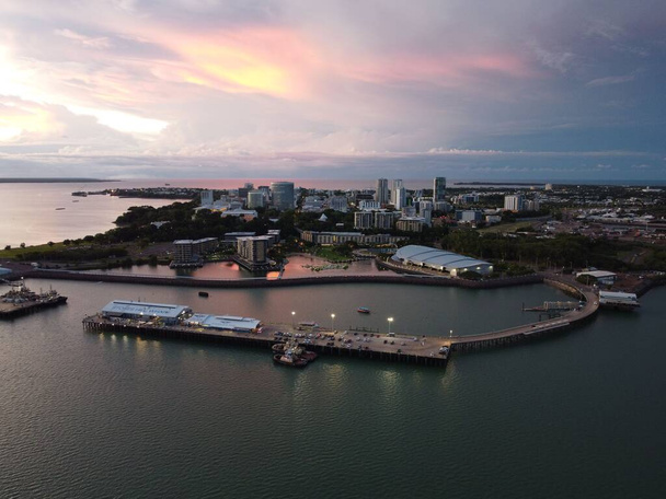 An aerial view of cityscape Florida surrounded by water during sunset - Fotó, kép