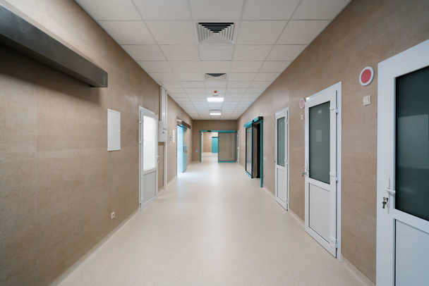 Hospital empty corridor Modern hospital automatic door entrance to operating room - Photo, Image