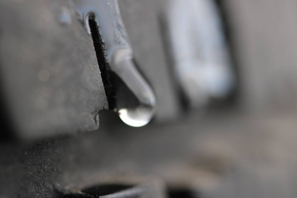 water dropping on a tire, macro - Foto, Bild