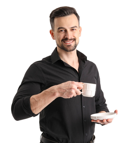 Handsome businessman with cup of coffee on white background - Foto, Bild