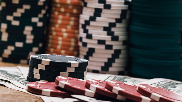 Stack of poker chips for high-stakes casino games - Foto, imagen