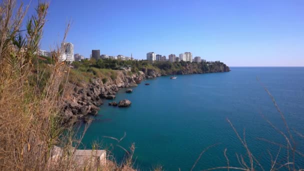 Antalya coast and Houses. There is a tour boat in the sea - Footage, Video