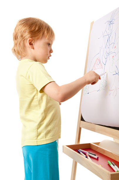 Four-year old boy drawing picture on easel - Φωτογραφία, εικόνα