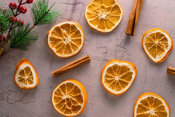 Dried orange slices on vintage background - 写真・画像