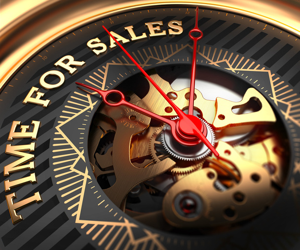 Tijd voor de verkoop op zwart-gouden horloge gezicht. - Foto, afbeelding