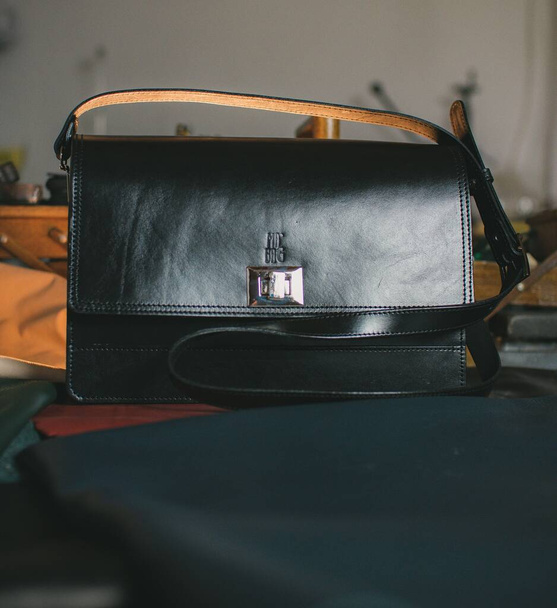 A shot of black natural leather bag - Фото, зображення