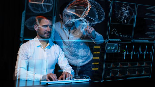 Two Caucasian bearded men are discussing medical screen of a virtual menu. Human brain research - Zdjęcie, obraz