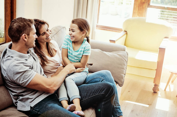 Spending quality time with their little dearest. a family bonding together at home - 写真・画像