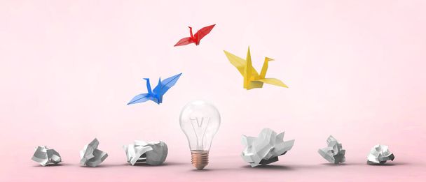 Лампочка с созданием новых идей и идей в бизнес-идеи развития через складывание бумажных птиц на красном фоне. копировальное пространство, баннер, сайт, почта - 3d рендеринг - Фото, изображение