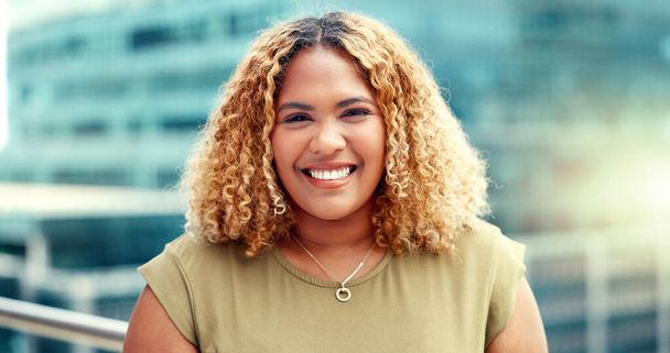 Business, black woman and city portrait while happy with outdoor with vision and pride. Face of entrepreneur person with urban buildings and motivation for career goals as future leader with a smile. - Fotoğraf, Görsel