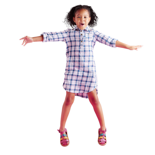 Energy, portrait of African girl jump and in png or transparent background. Celebration or freedom, isolated cheerful child dancing with curly hair smiling and enjoying herself while playing. - Fotó, kép