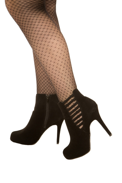 Nice pair of womens legs in black stockings and high heels - Fotoğraf, Görsel