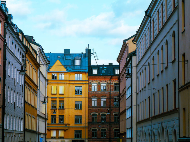 Low angle view of buildings in city against sky - Fotoğraf, Görsel