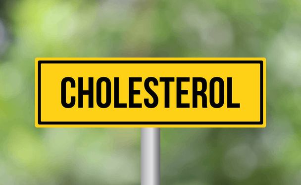 Señal de carretera de colesterol sobre fondo borroso - Foto, Imagen