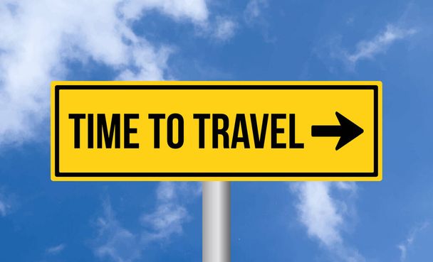 Time to travel road sign on cloudy sky background - Photo, Image