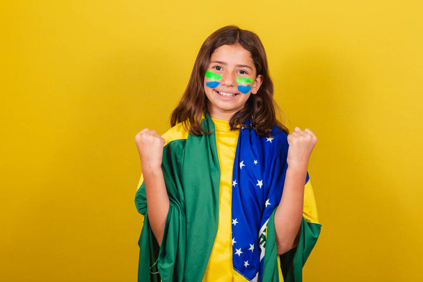 Brazilian, Caucasian girl, football fan, Positive, affirmative, approval. - Фото, изображение
