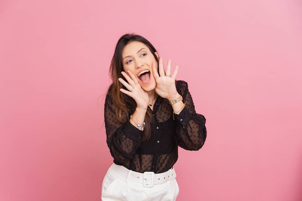 Beautiful Brazilian Caucasian Woman, Pink Background, Screaming, Calling, Promotion, Discount, Announcement, Inviting. - Photo, image