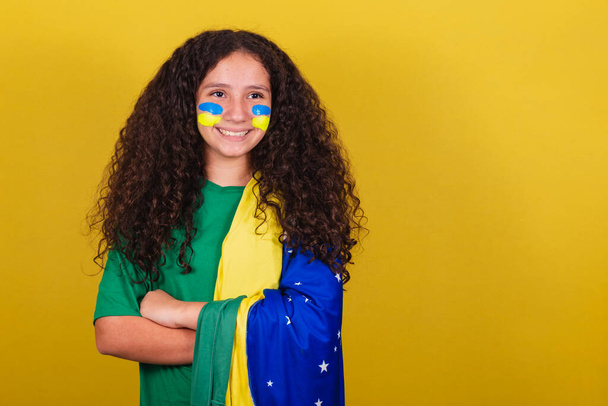 Brazilian girl, Caucasian, football fan, Arms crossed, optimistic, positive. - Fotoğraf, Görsel