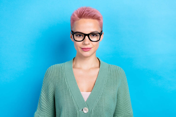 Portrait of confident business woman dyed hairstyle wear green shirt posing for top rich person magazine isolated on blue color background. - 写真・画像