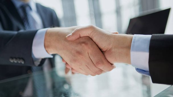 Real estate broker agent Shake hands after customer signing contract document for ownership realty purchase in the office, Business concept and signing contract - Φωτογραφία, εικόνα
