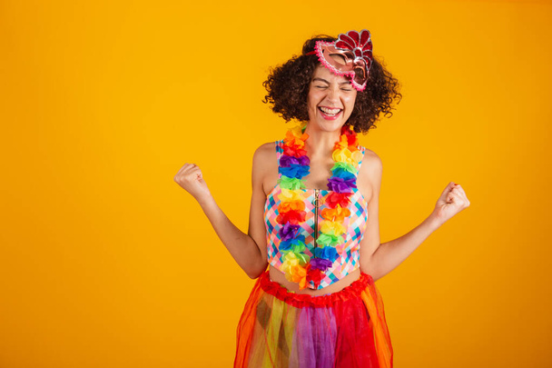 Beautiful Brazilian woman, dressed in carnival clothes, celebrating. - Фото, зображення