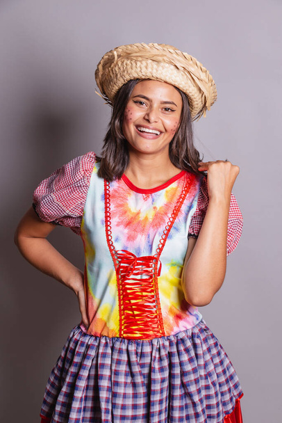 Brazilian woman wearing country clothes, So Joo party, Junina party. photo poses   - Photo, image