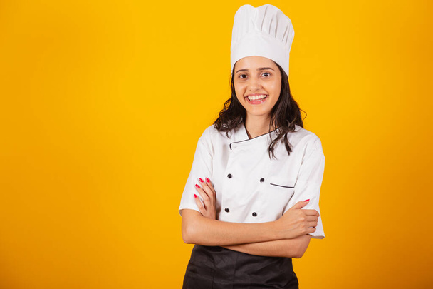 Brazilian woman, head chef, cook, with arms crossed. - Foto, afbeelding